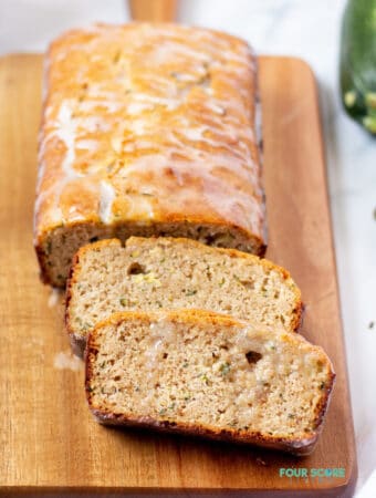 keto zucchini bread sliced on a cutting board