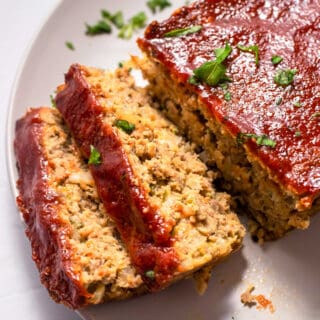 keto meatloaf sliced on a white plate