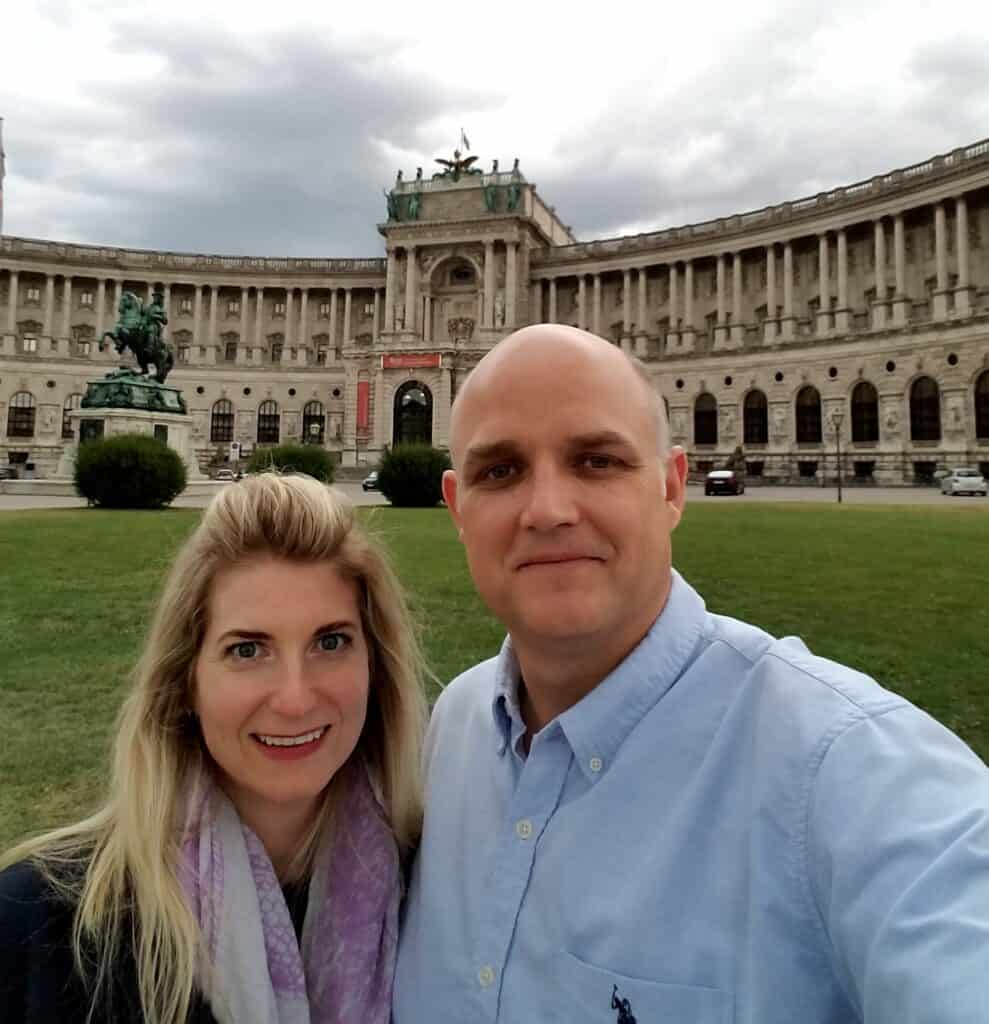 A picture of Becky and Dane in front of a palace in Vienna, Austria.