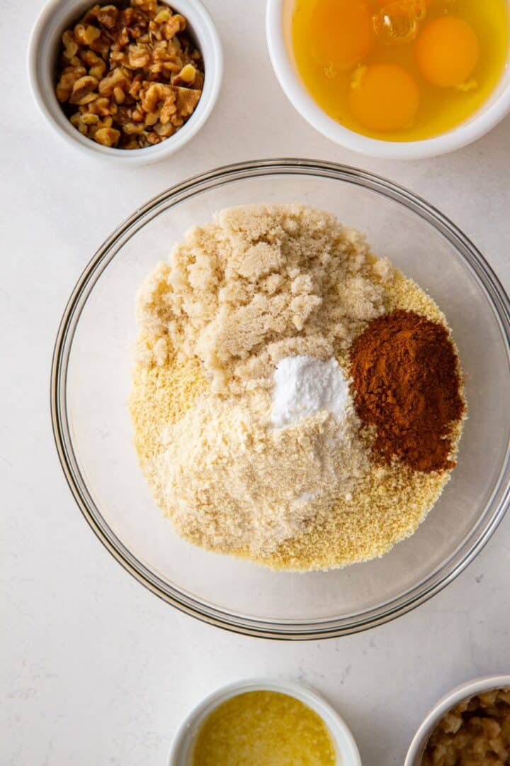 glass bowl containing the dry ingredients for making banana bread