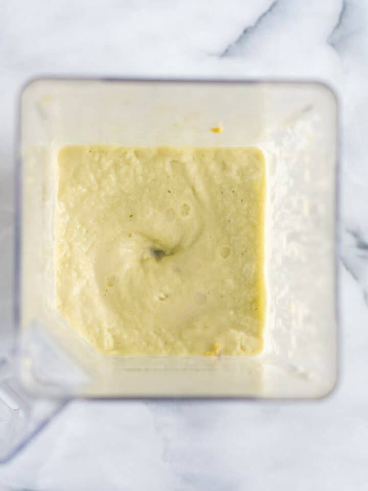 Blended keto avocado smoothie inside of a blender.