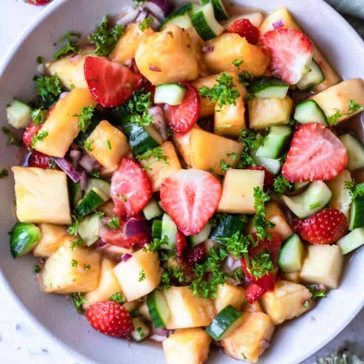 Bowl containing a fully prepared pineapple salad.
