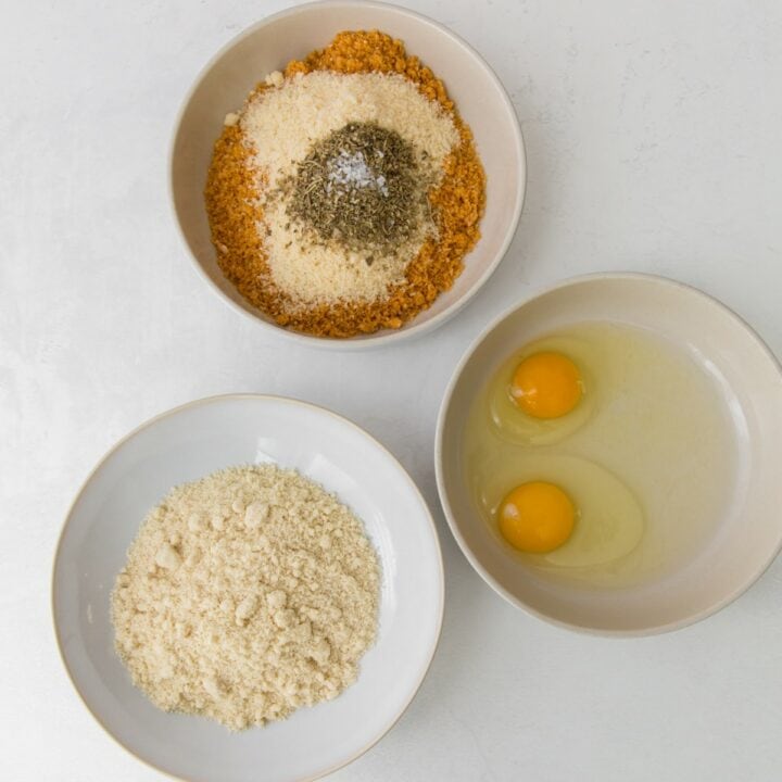 Three bowls with the different ingredients to make your dredging station for the eggplant slices.