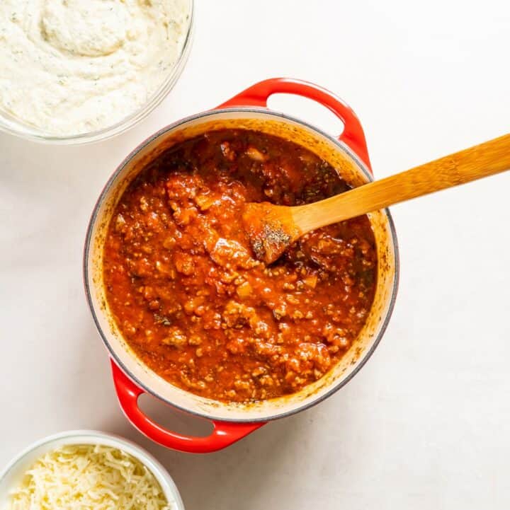 Saucepan containing the fully cooked sauce for lasagna.