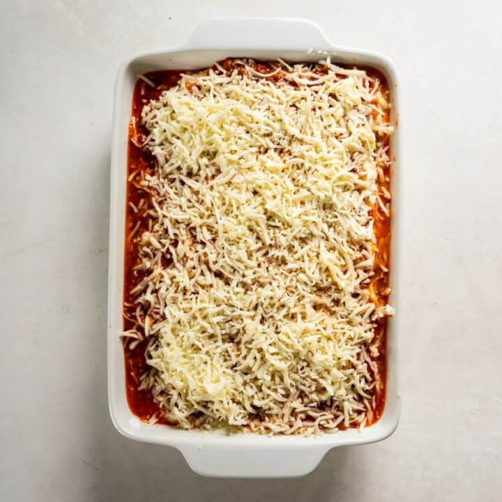 Baking dish with the fully assembled zucchini lasagna ready to bake.