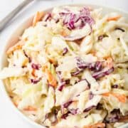 keto coleslaw in a white bowl.